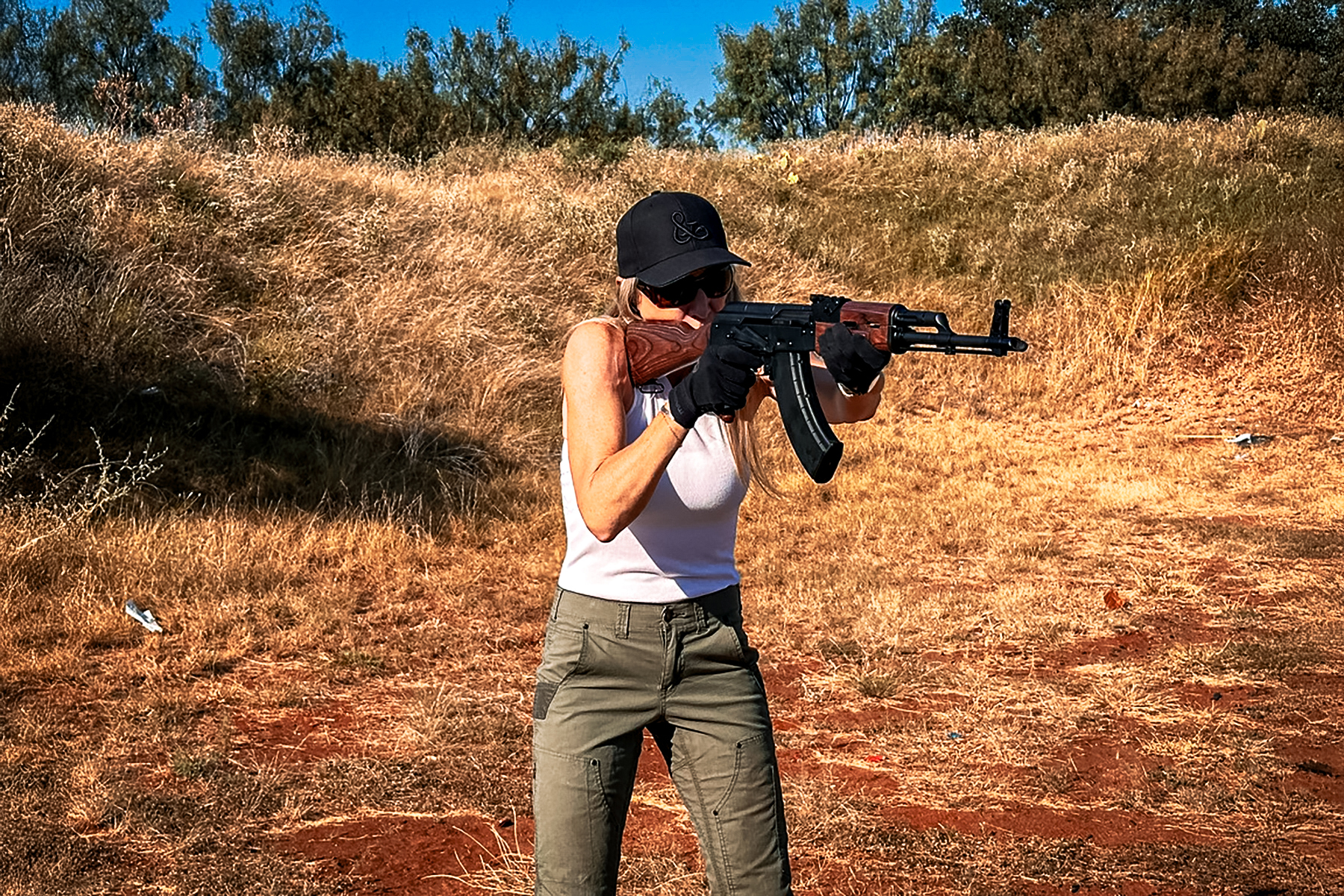 a woman shooting the Soviet Arms PSAK-47 GF5 Forged Classic Rifle from PSA