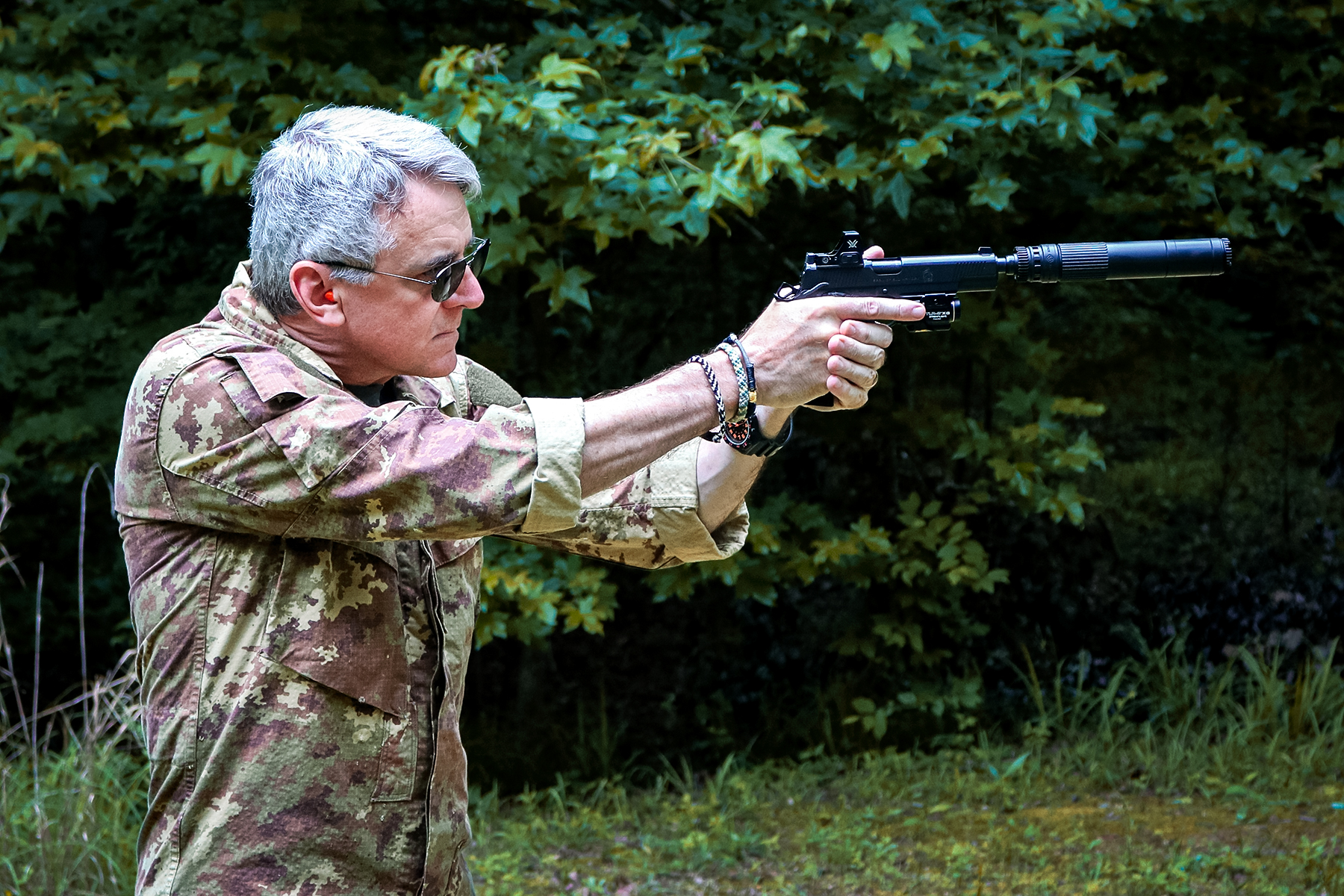 the author aiming the Springfield Operator and the dead air mojave 45 suppressor
