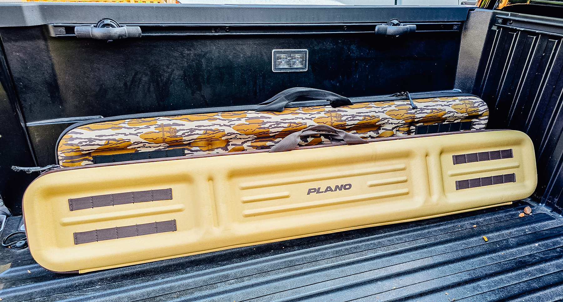 Plano Diverge rifle and shotgun case in a truck bed