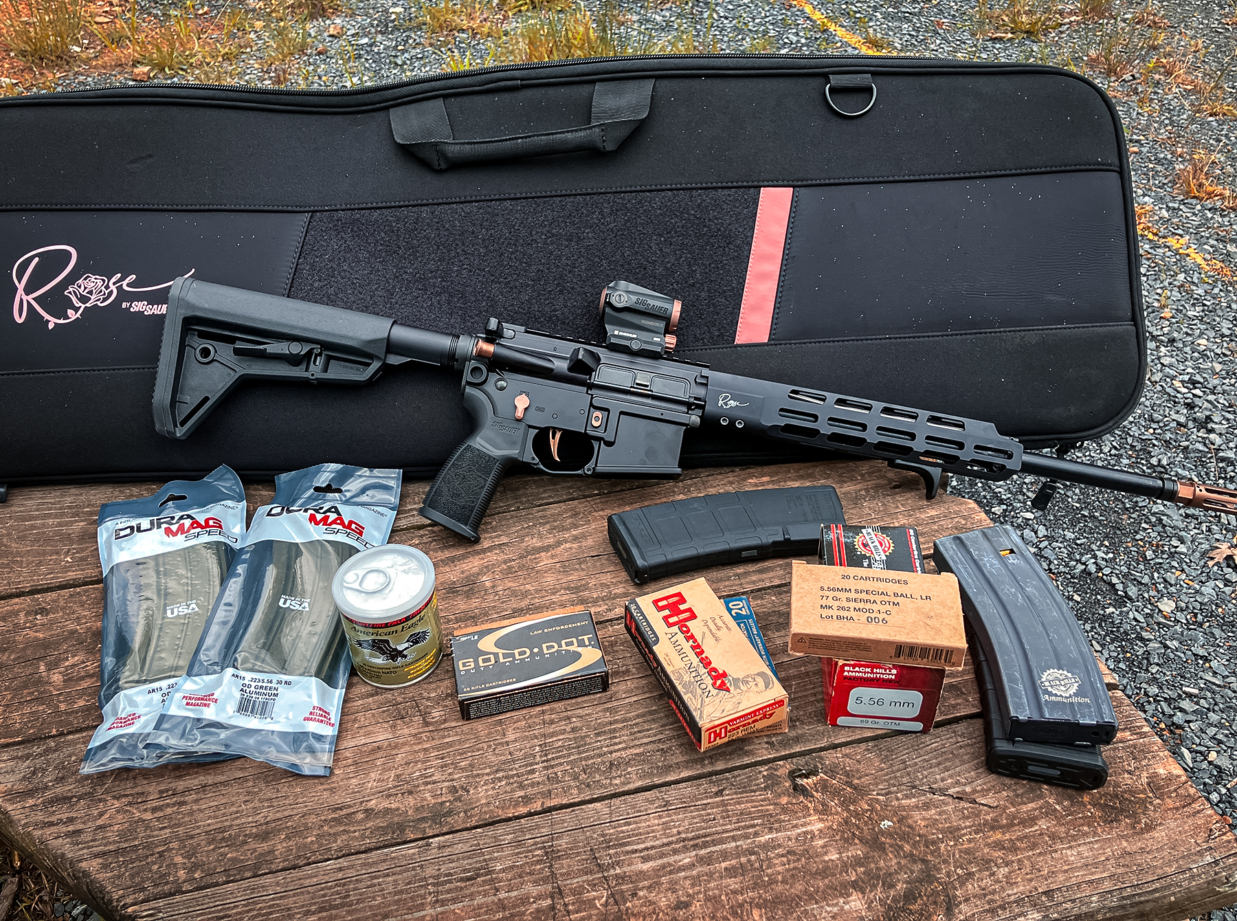 SIG SAUER M400 ROSE at the range with ammo and mags