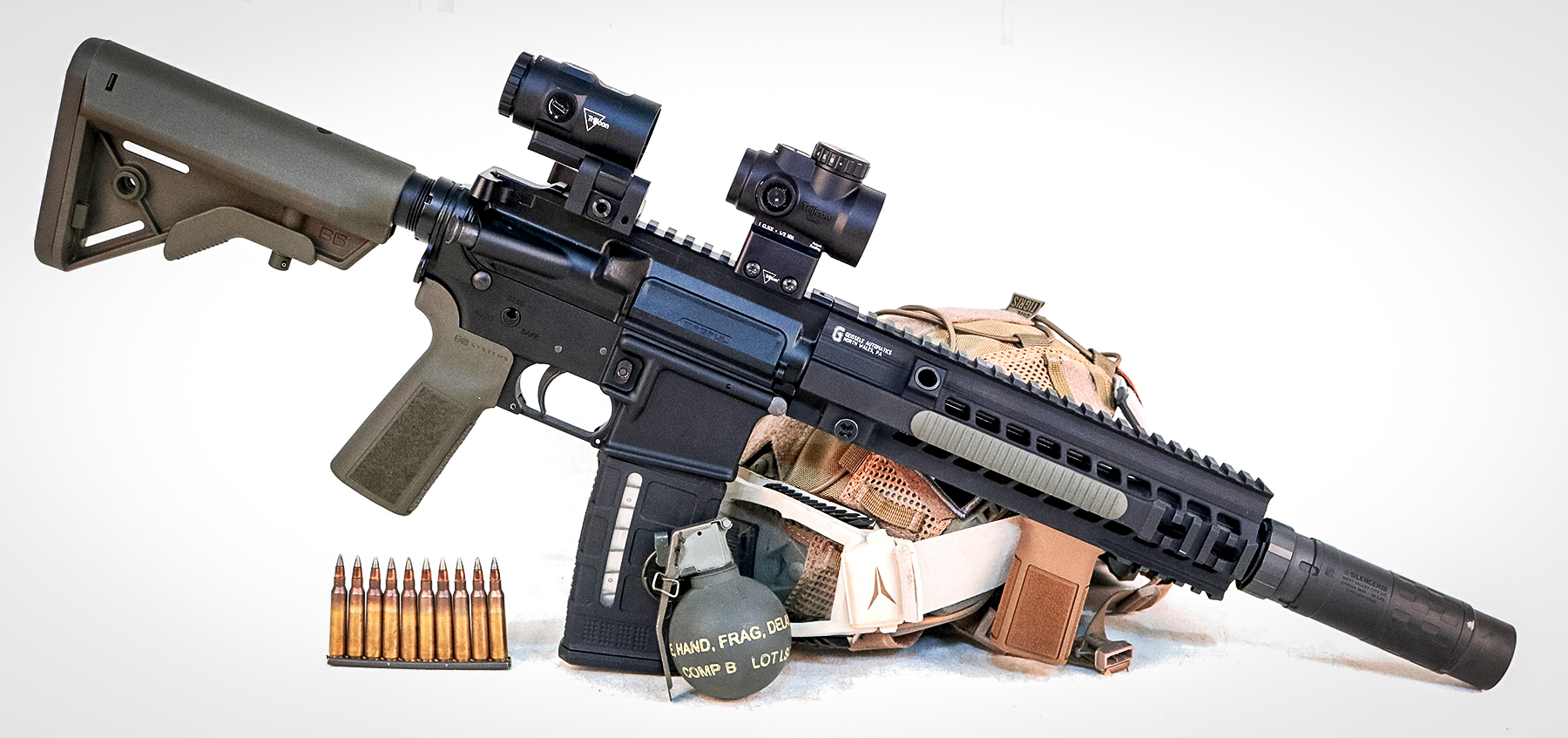 Trijicon MRO SD with magnifier on an AR with ammo and a grenade
