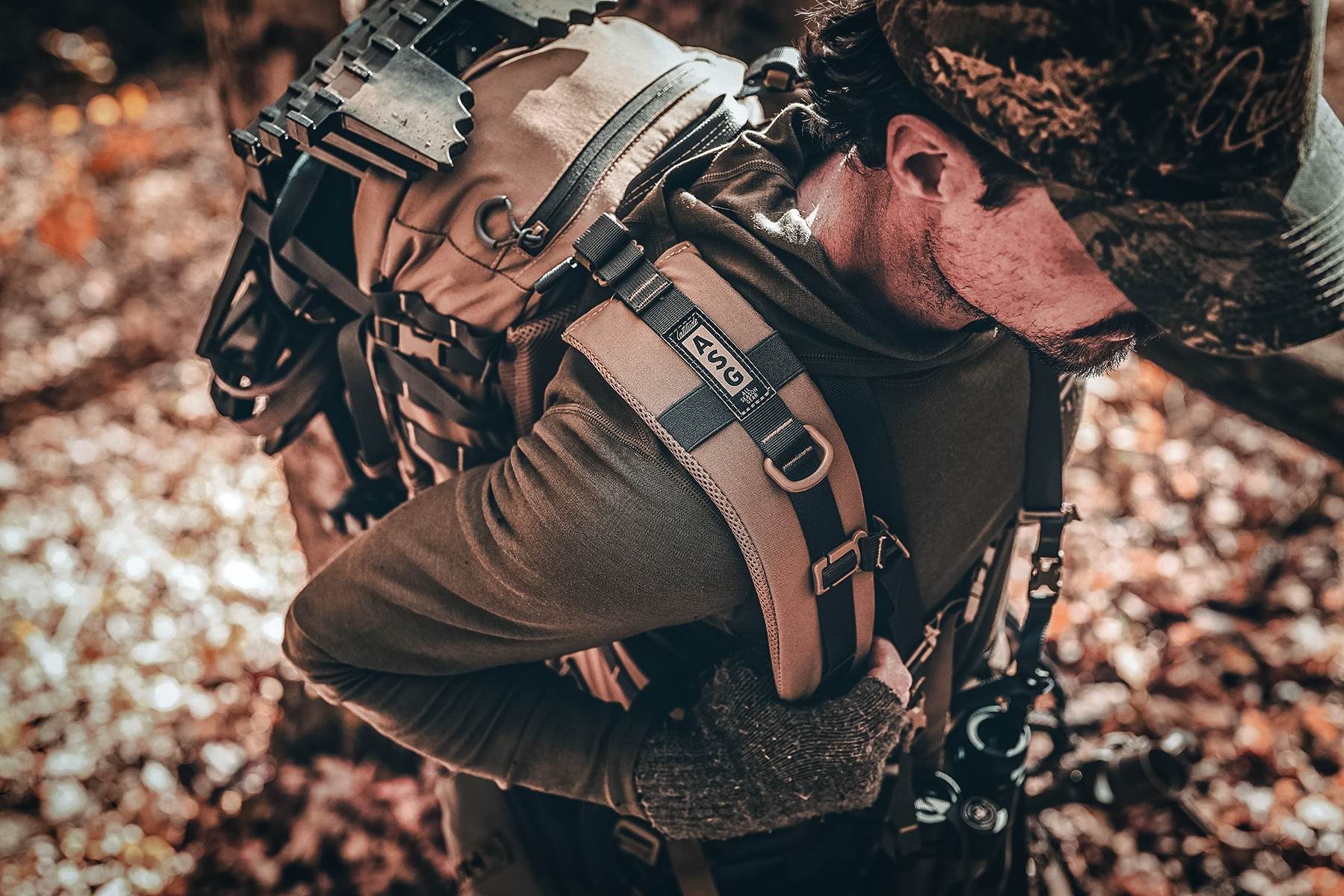 a hunter carrying a pack