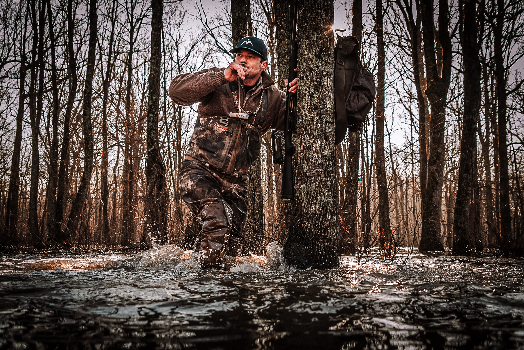 Drew McIntosh of Migra Ammunition calling in the flooded timber