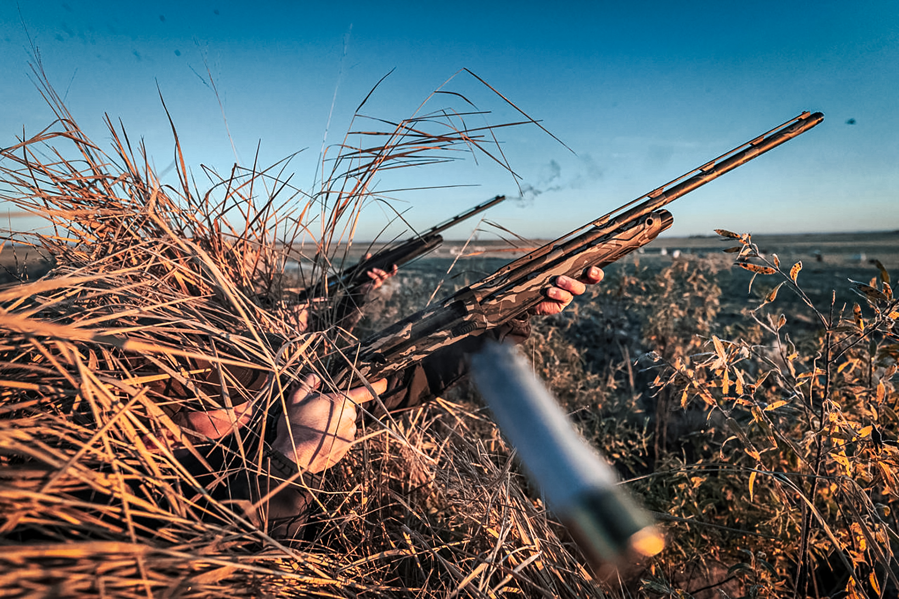 Beretta AX800 Suprema firing in a duck blind