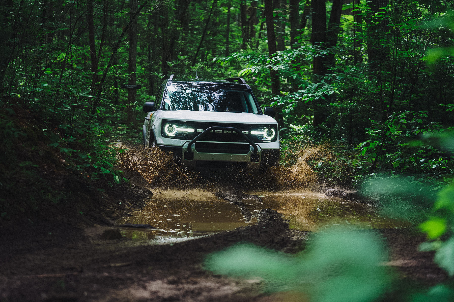 Ford Broncos driving off road