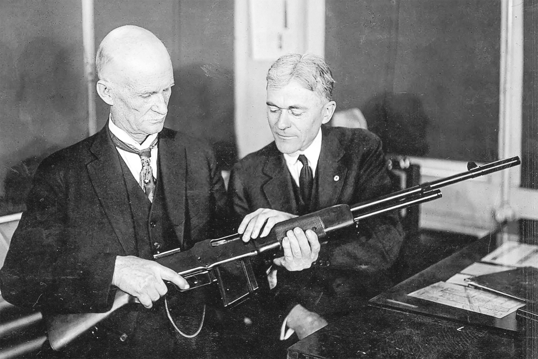 John Browning holding a BAR