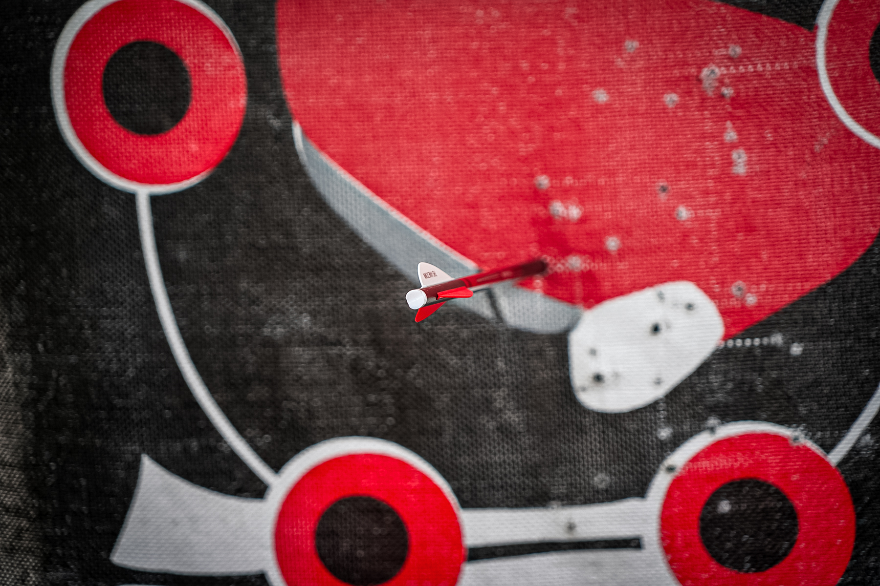 a crossbow bolt in a bag target