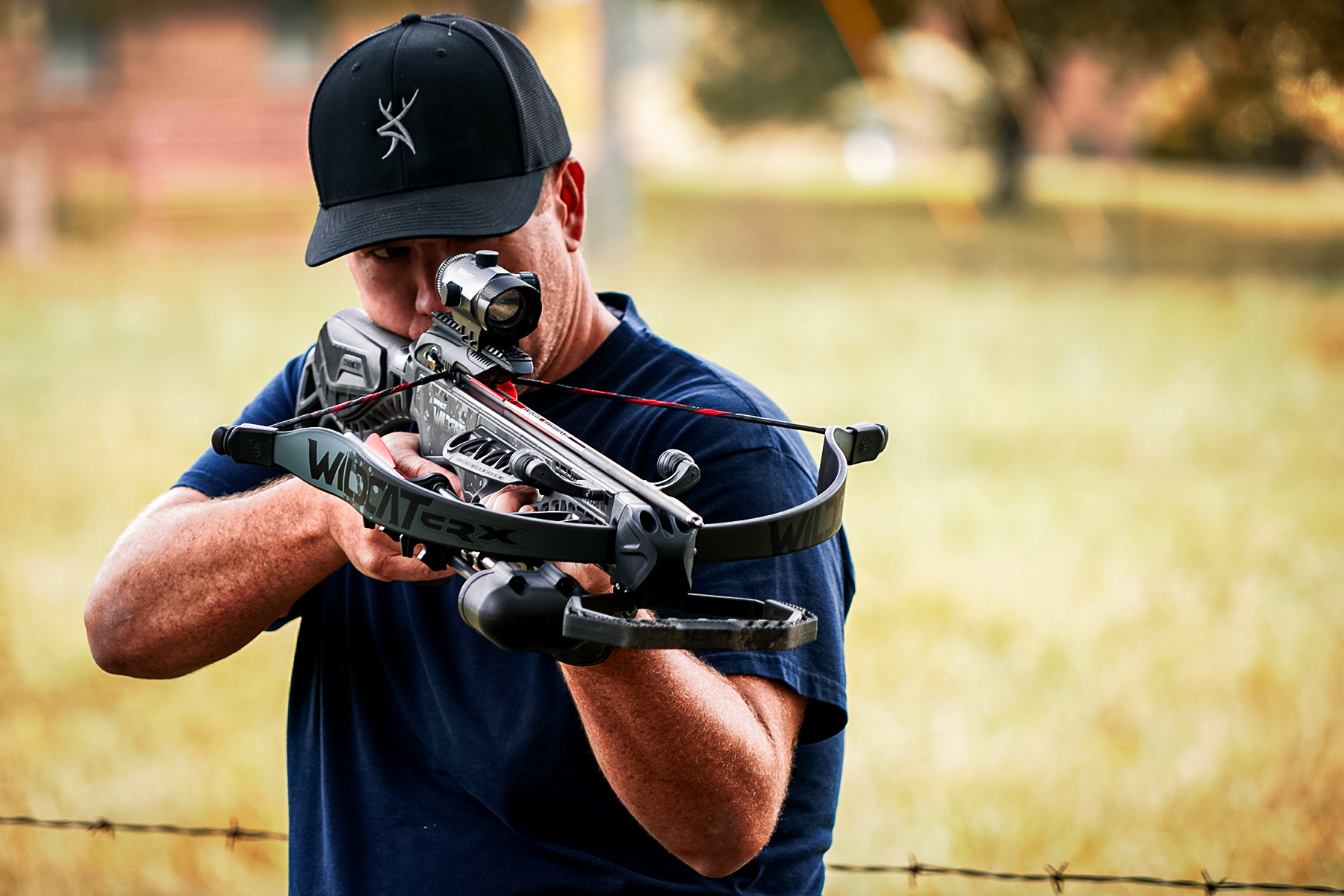 a man aiming the Barnett Wildcat CRX crossbow