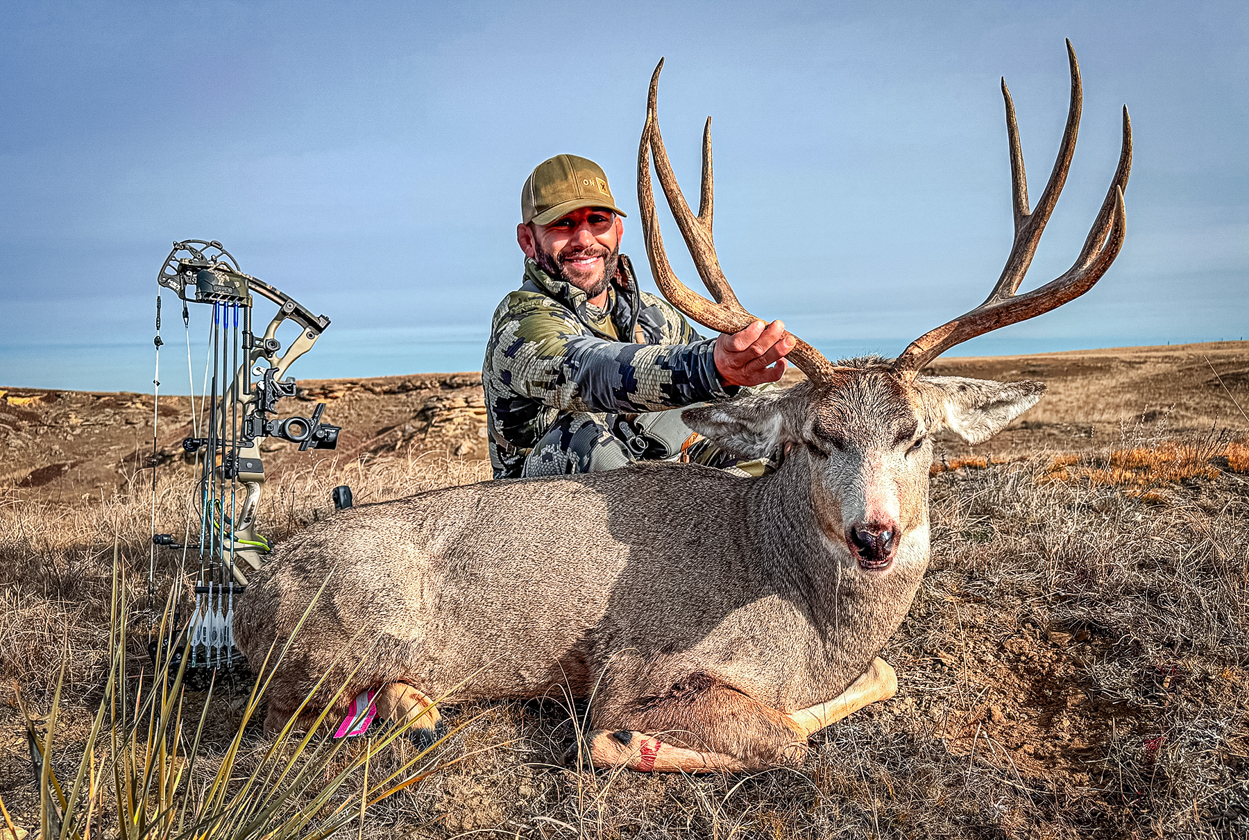 Chad Mendes with a big mule deer buck