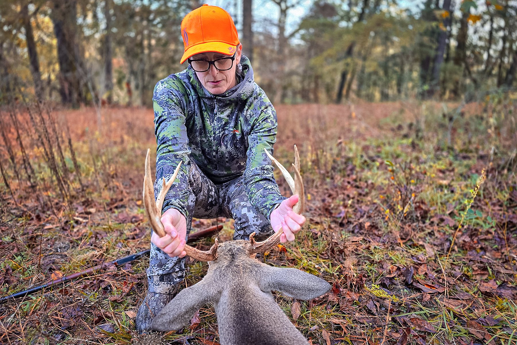 a hunter with a buck