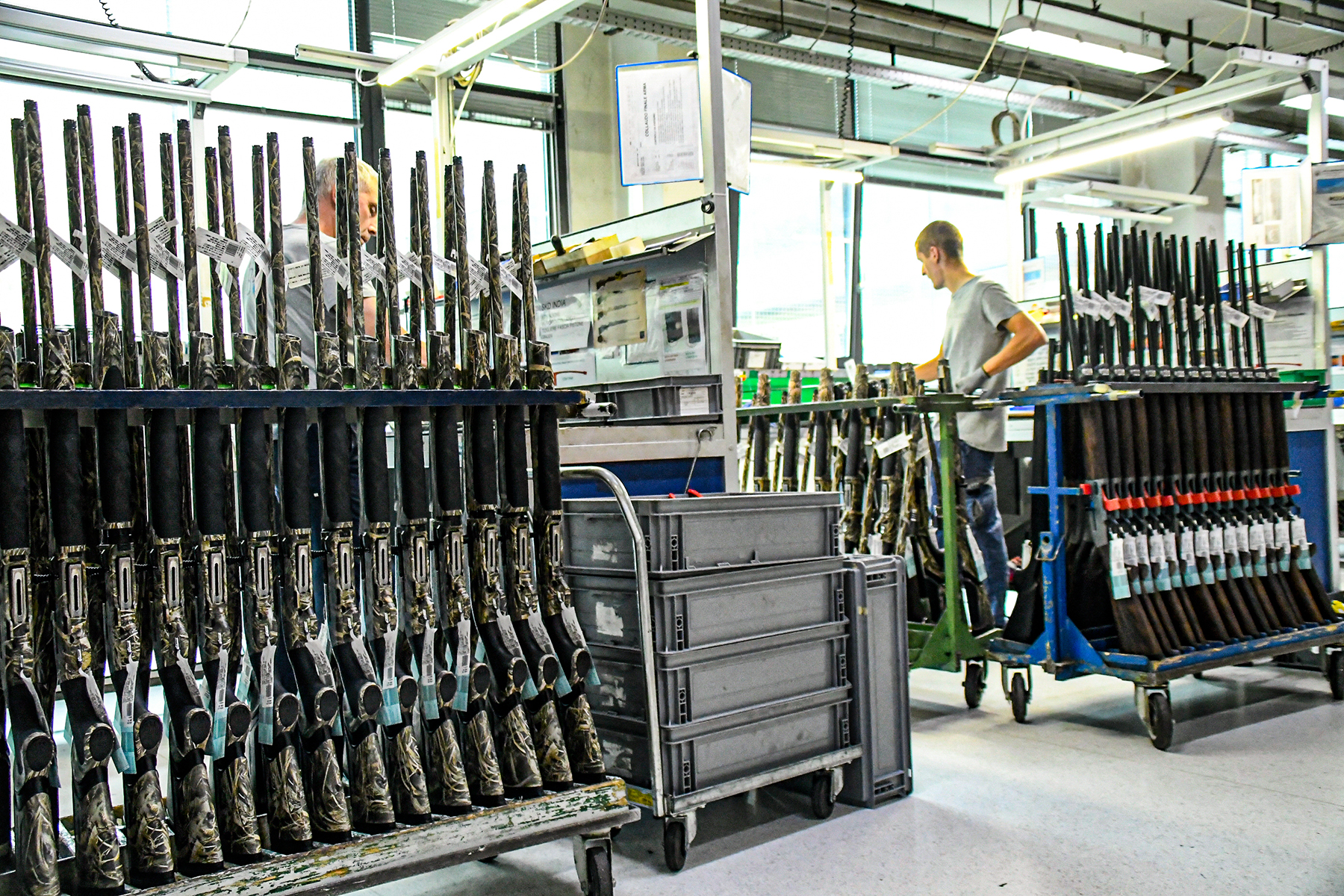 Beretta shotguns lined up in factory