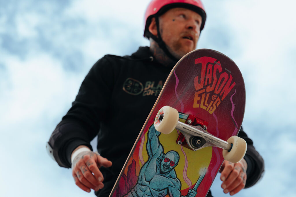 Jason Ellis on a skateboard
