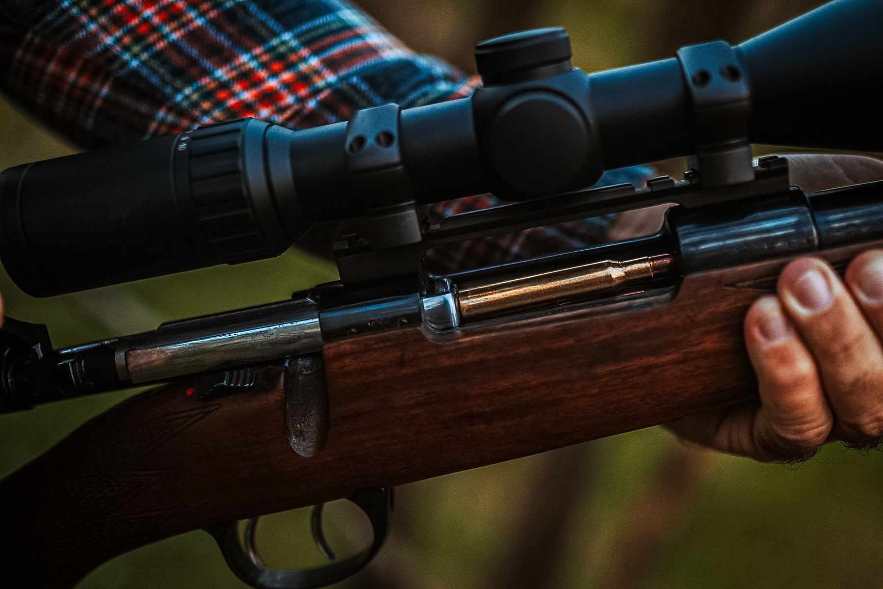 action open on a bolt action rifle
