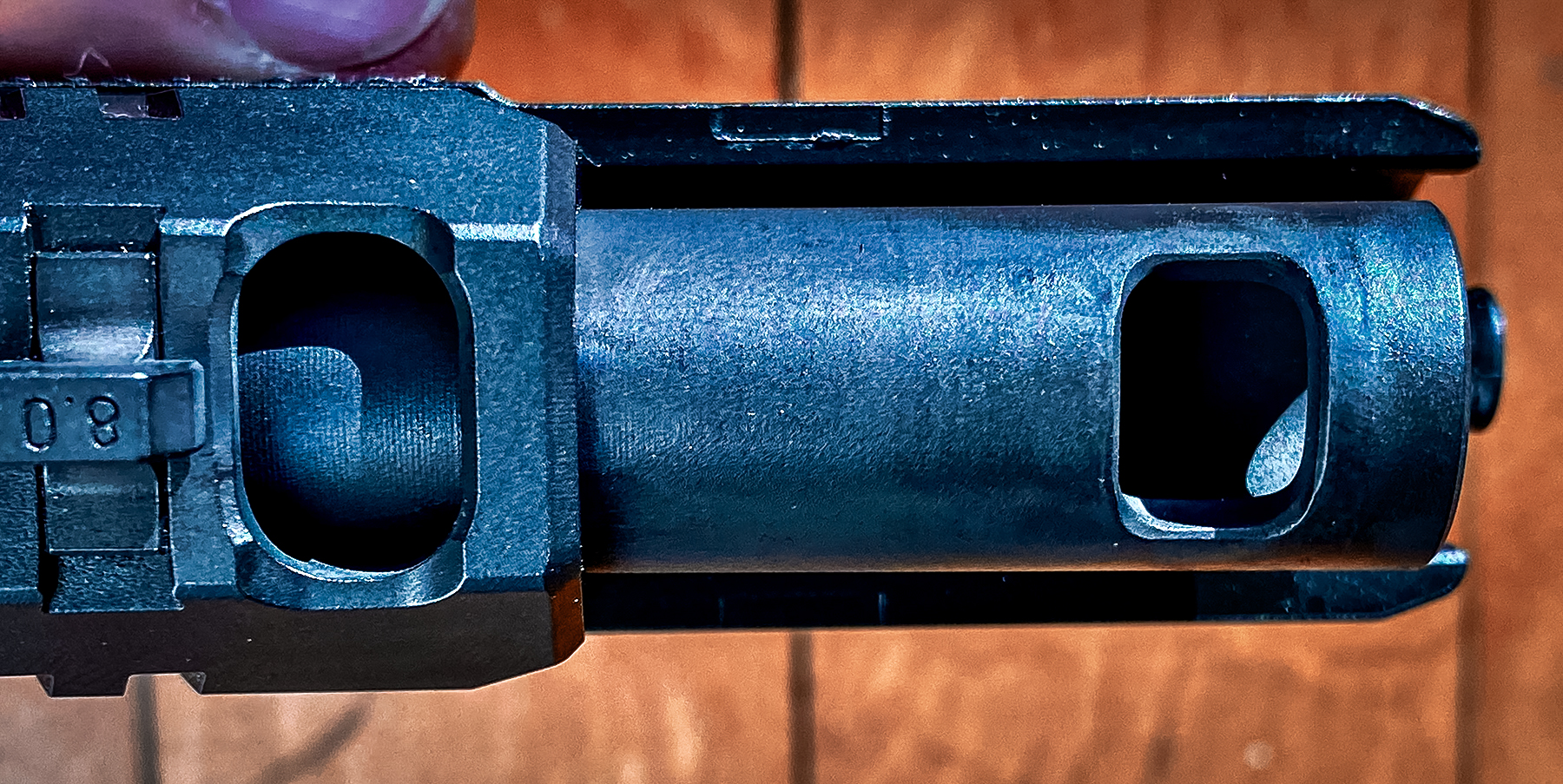 CZ-USA P-10 C Ported handgun with slide locked back exposing compensator