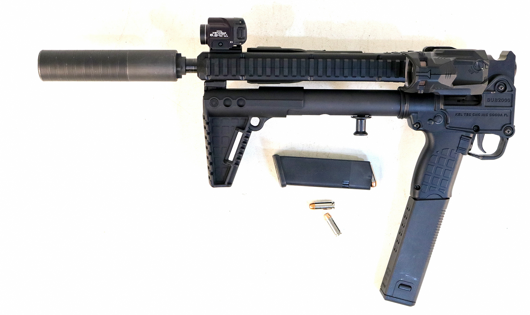KelTec SUB2000 folded with suppressor and 30-round magazine