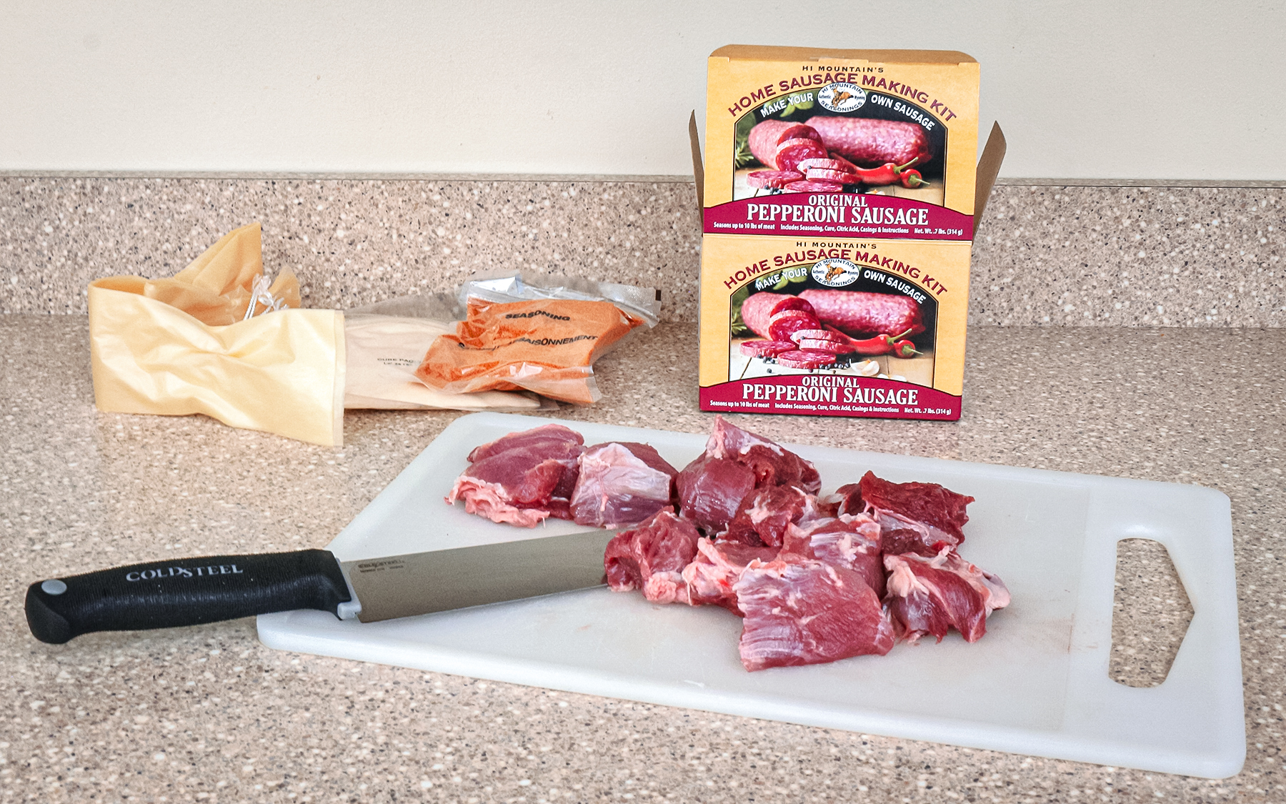 cutting meat for sausage