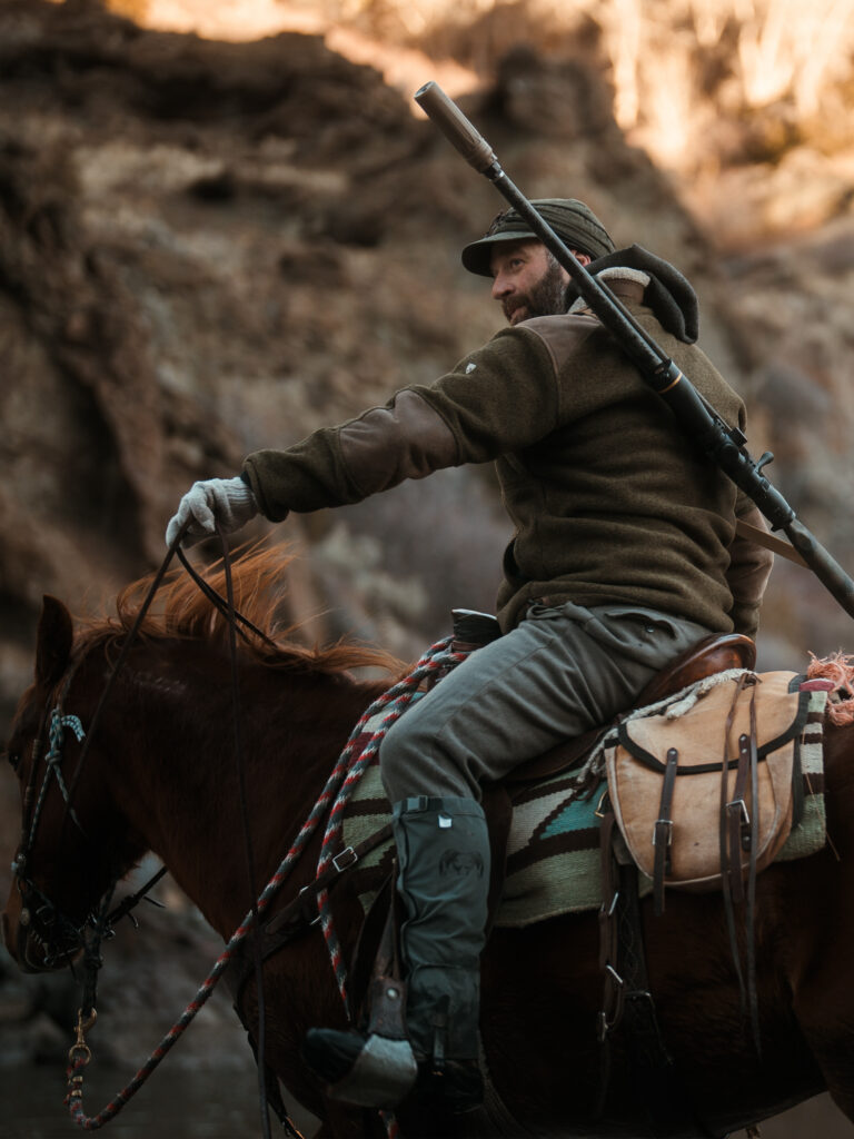 backcountry hunting on horseback with a Dead Air silencer-equipped rifle
