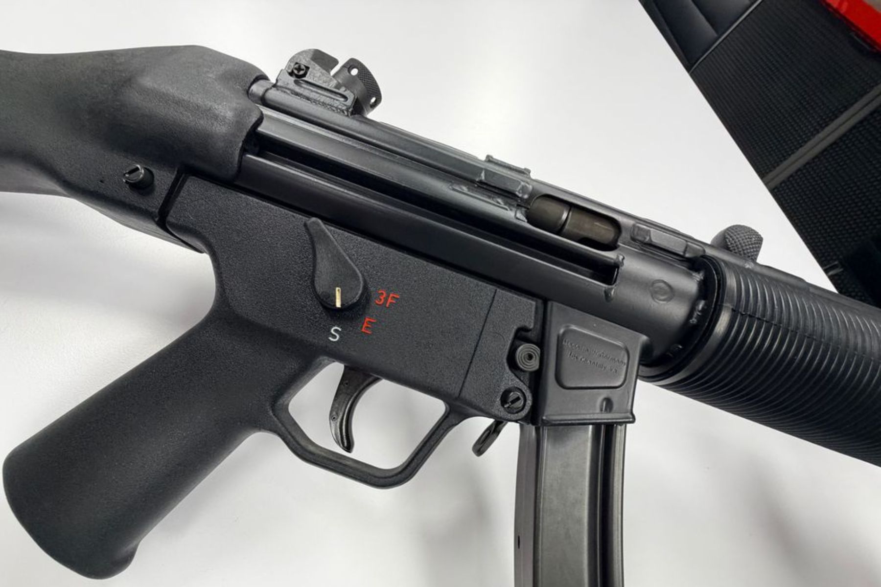 A closeup of the HK MP5SD fire control group.