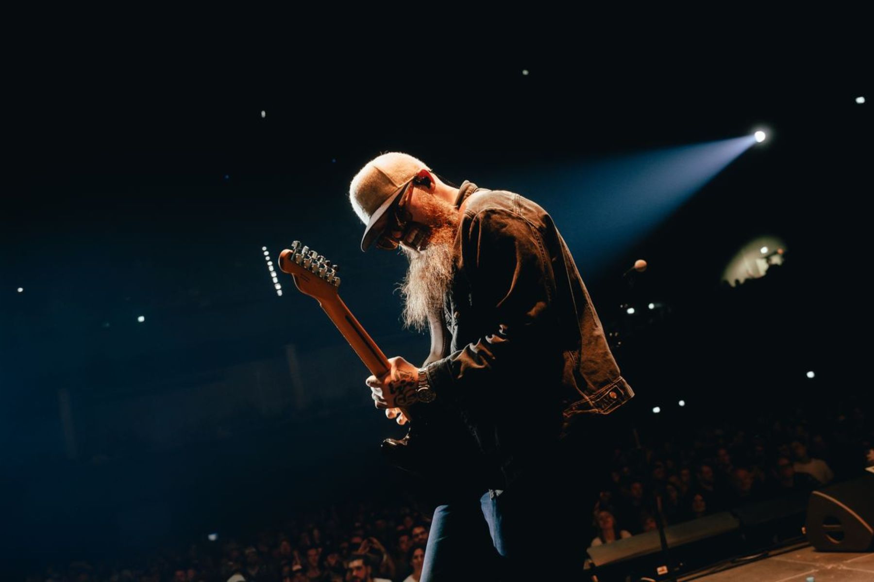 Isaac Gibson plays guitar for band 49 Winchester