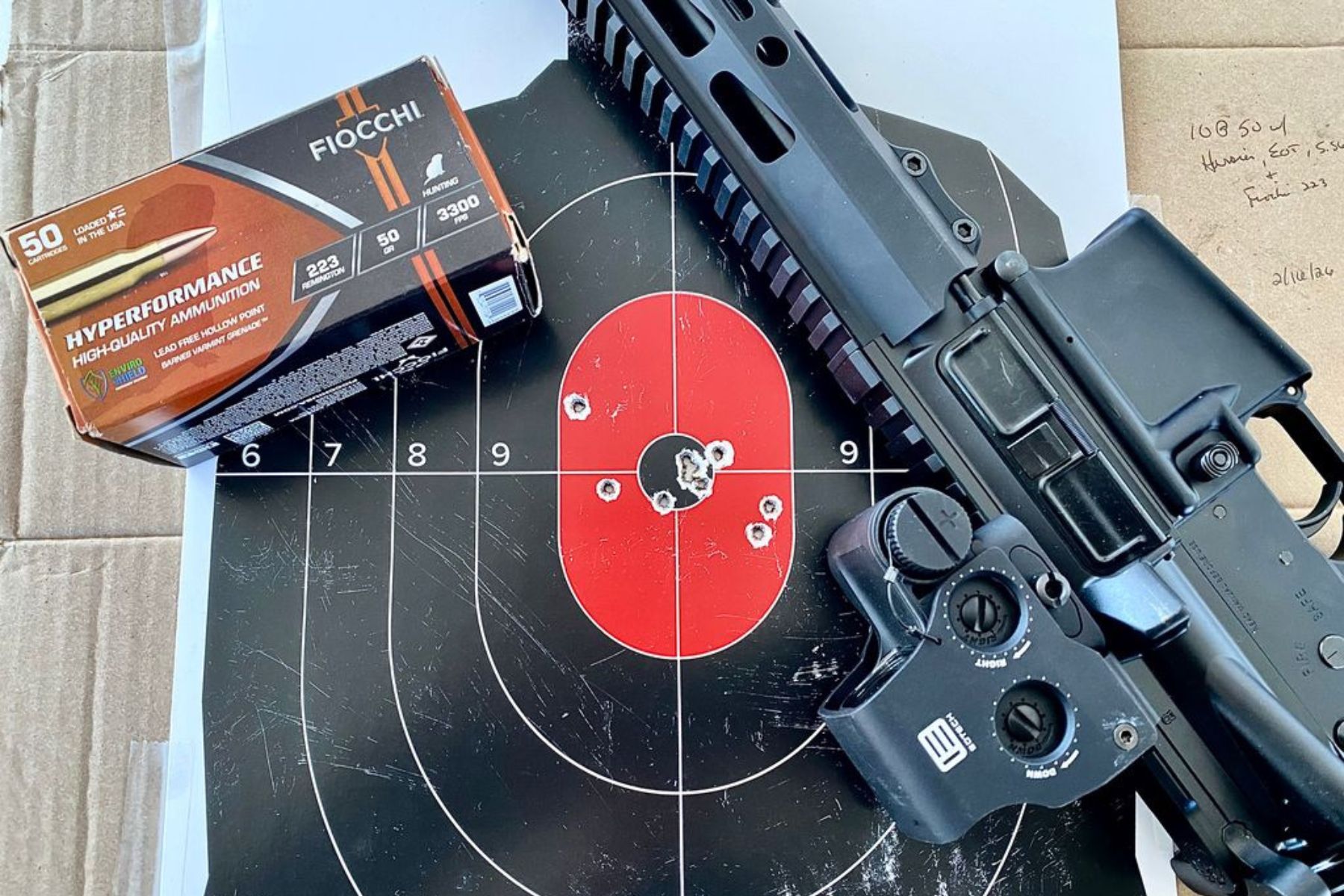 The Ruger Harrier with EOTech EXPS3-DCR Holographic Weapon Sight and 10 rounds at 50 yards.