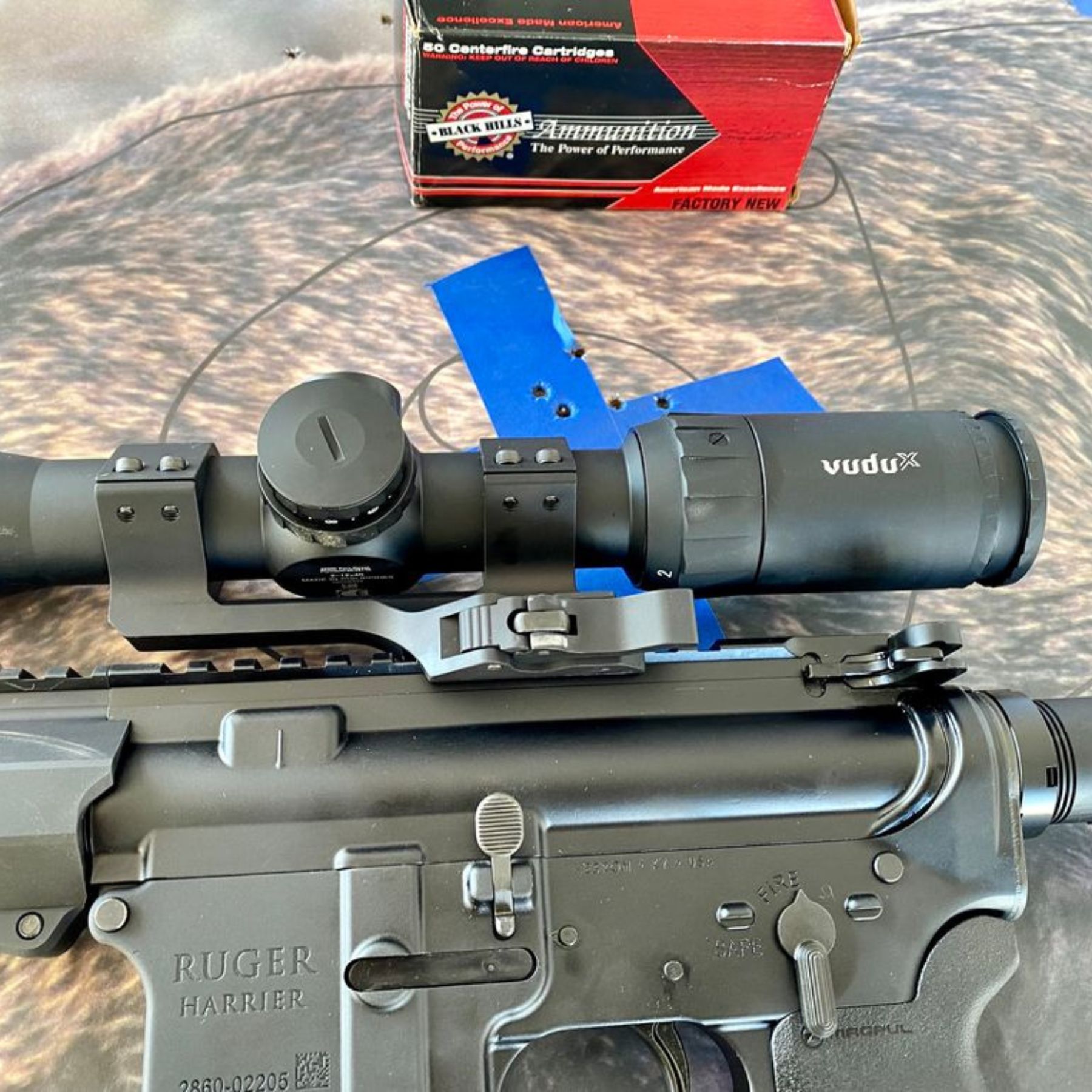 Ruger Harrier and a VuduX scope on a target with Black Hills ammo