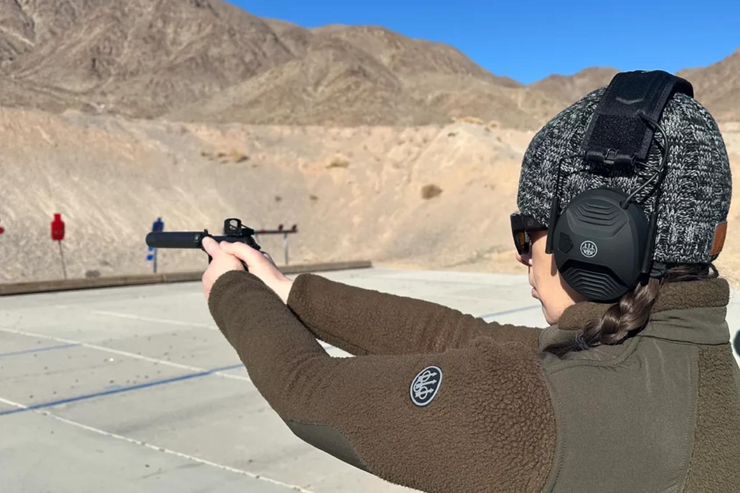 Barb Melloni shooting suppressed Beretta 20X Bobcat