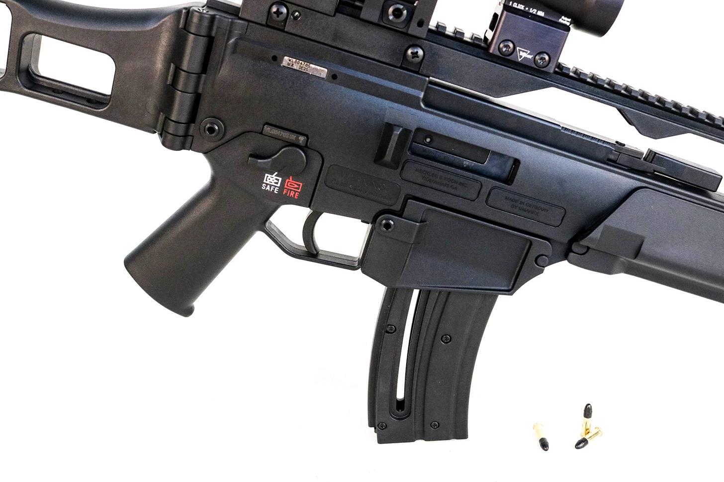 HK G36 Rimfire receiver with loose .22LR ammo