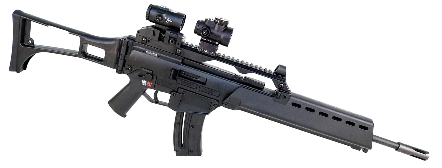 HK G36 Rimfire topped with a Trijicon red dot and magnifier