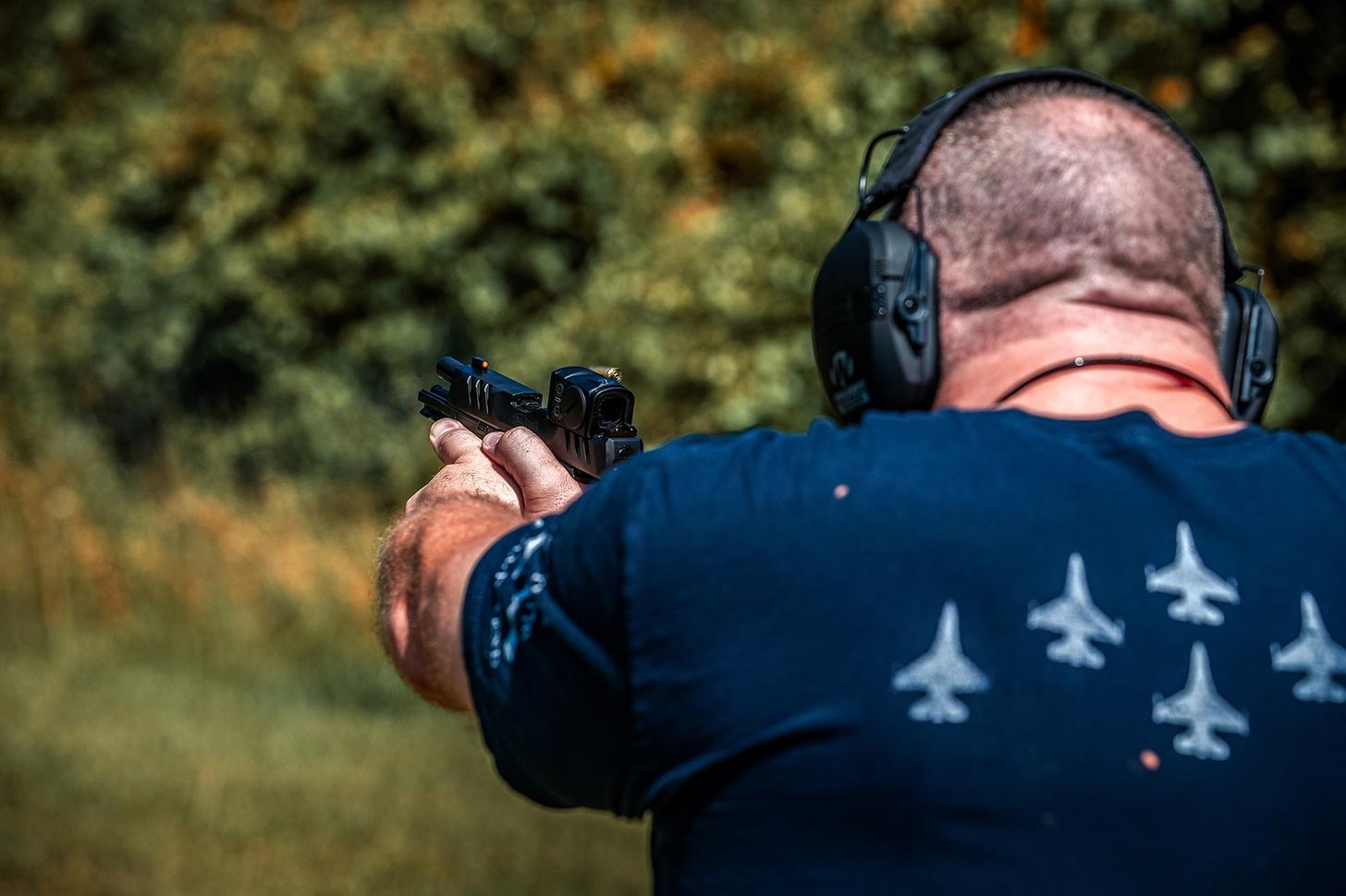 A man firing the Walther PDP F Pro ACRO