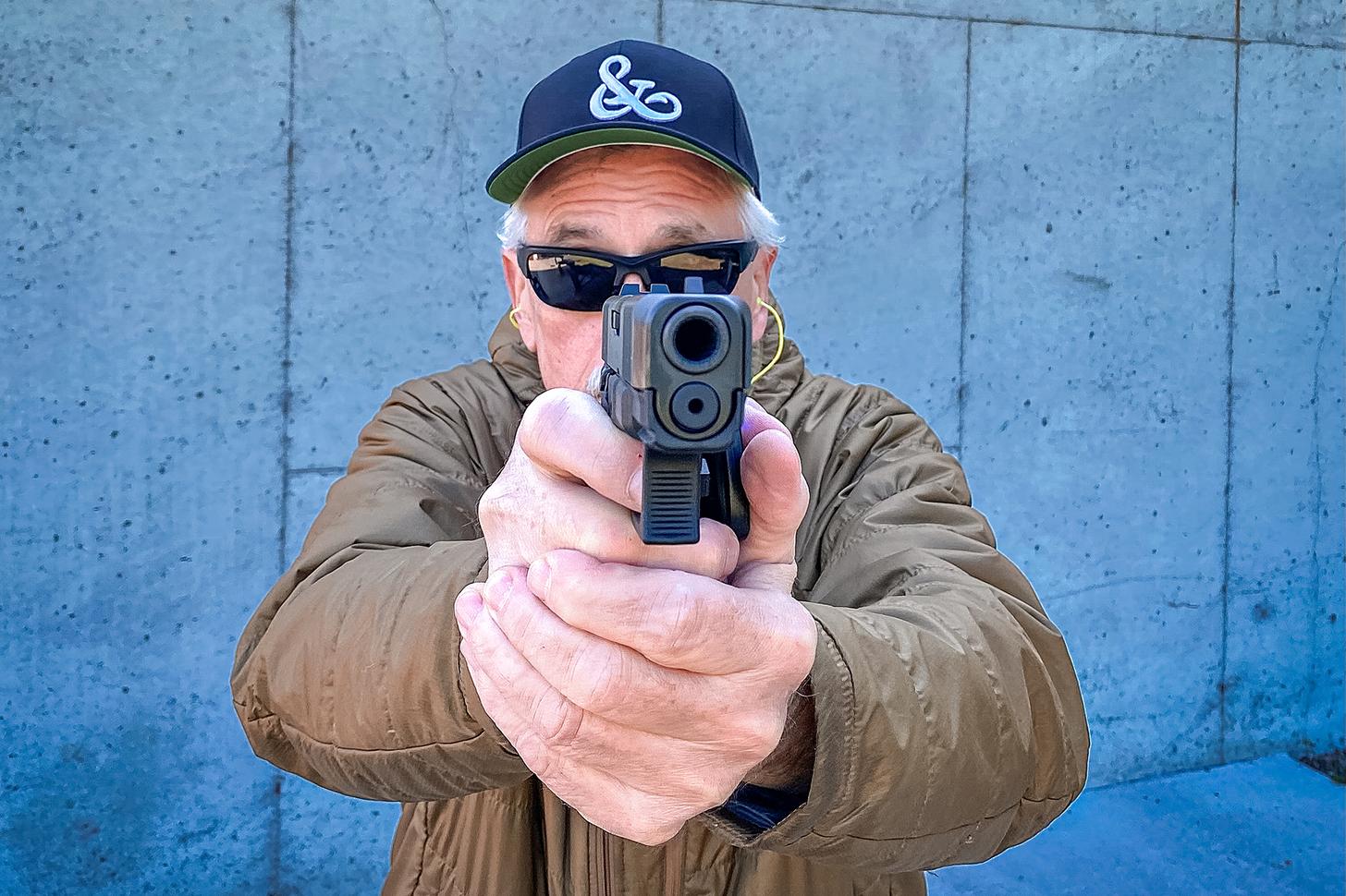 author aiming the Glock 29 Gen5