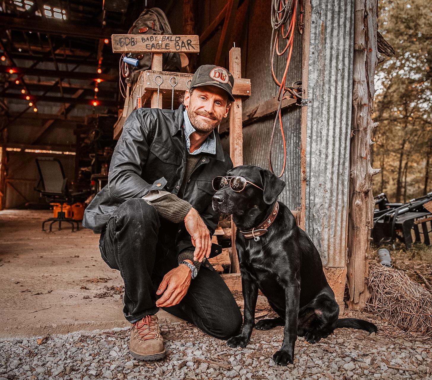 Chase Rice with his dog wearing sunglasses