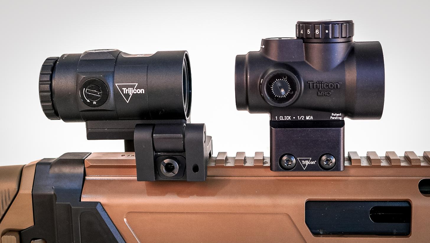 A Trijicon MRO red dot with a 3x magnifier