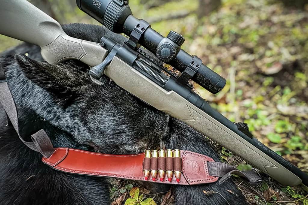 The author’s combo of  Mossberg rifle, Hornady ammo, and Swarovski scope proved to be the perfect medicine for this big Canadian bruin. 