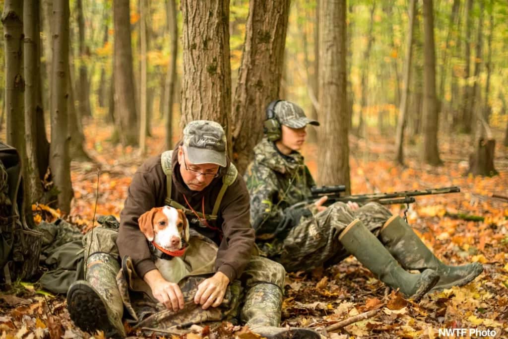 Fall turkey hunters with a turkey dog