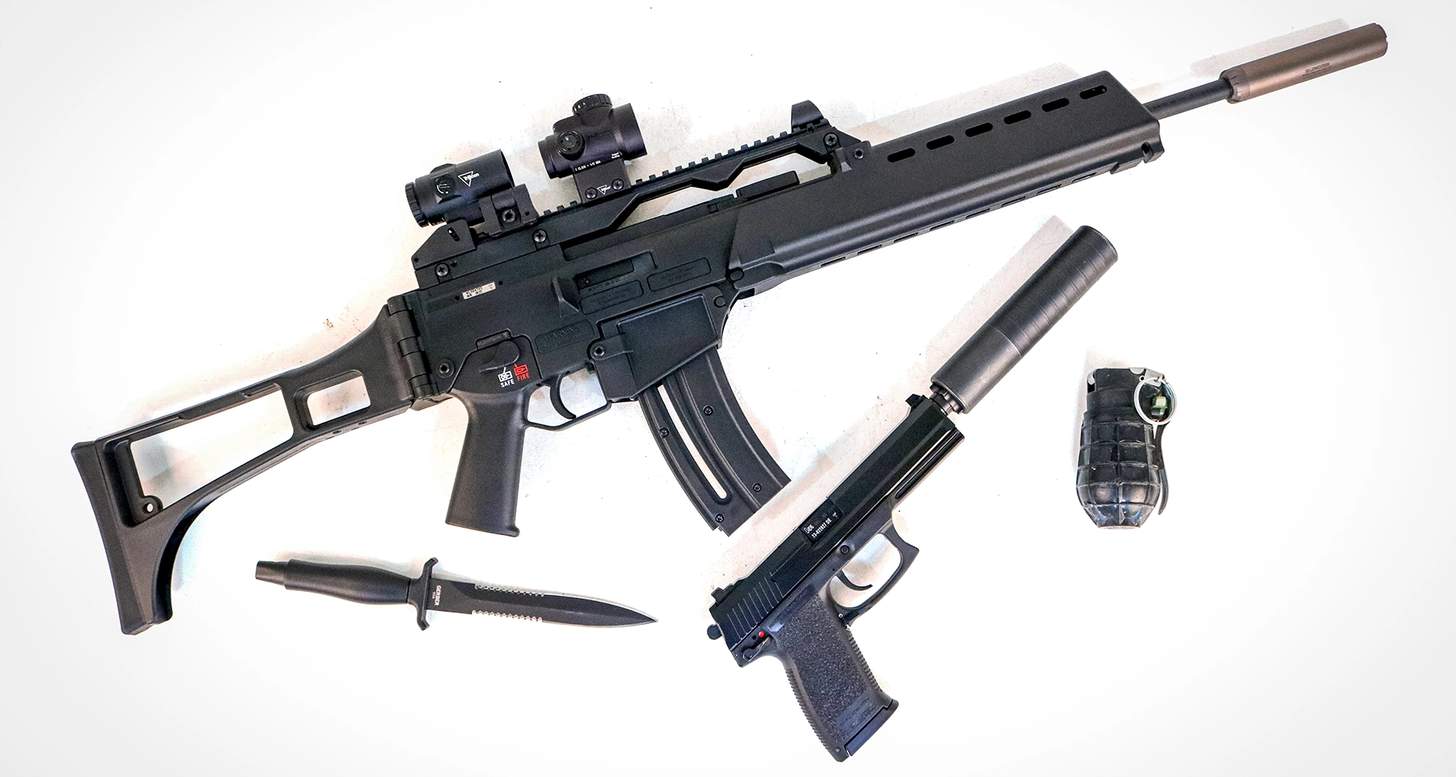 HK G36 Rimfire with an HK USP, both with suppressors
