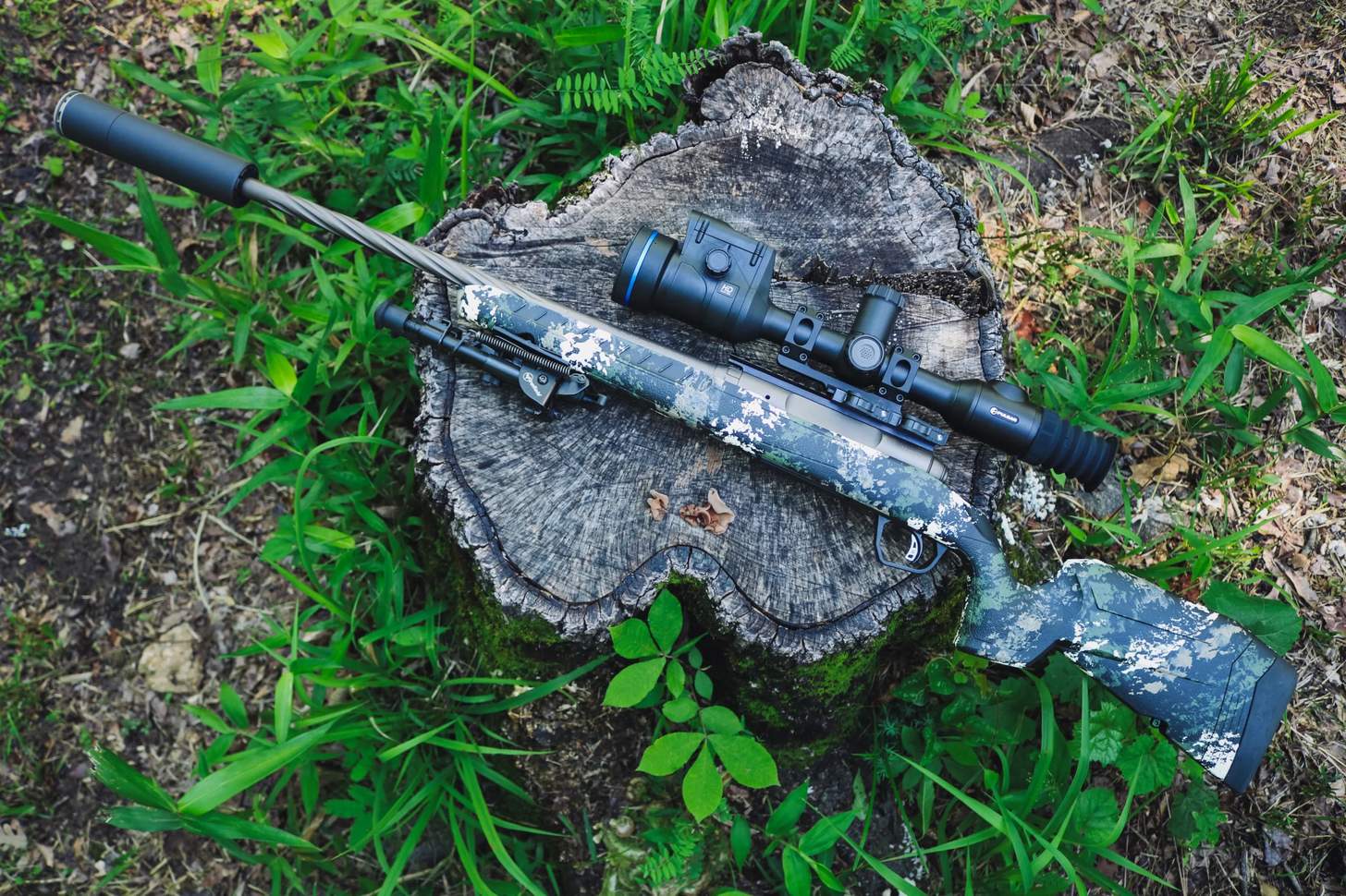 A Savage Axis 2 Pro rifle fitted with a SilencerCo Scythe STM suppressor and a Pulsar Thermion 2 LRF XL60 thermal riflescope