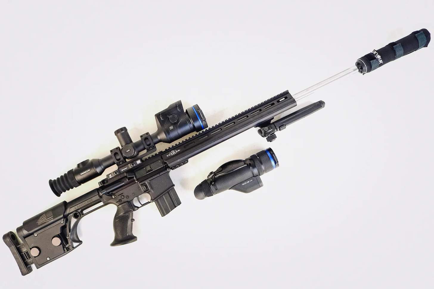 the Pulsar Thermion XL60 thermal scope mounte don a precision AR rifle, along with the Telos LRF XL50 Monocular