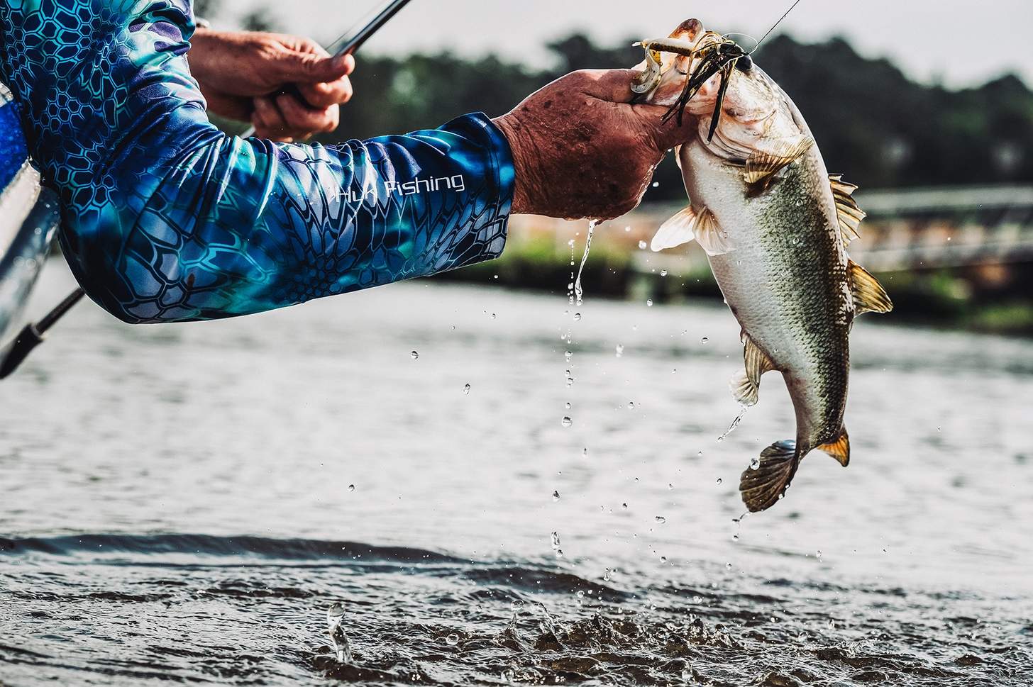 angler lipping a bass