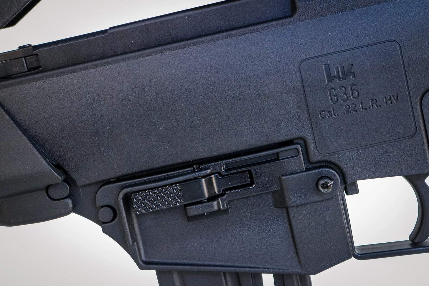 HK G36 Rimfire magazine release close up