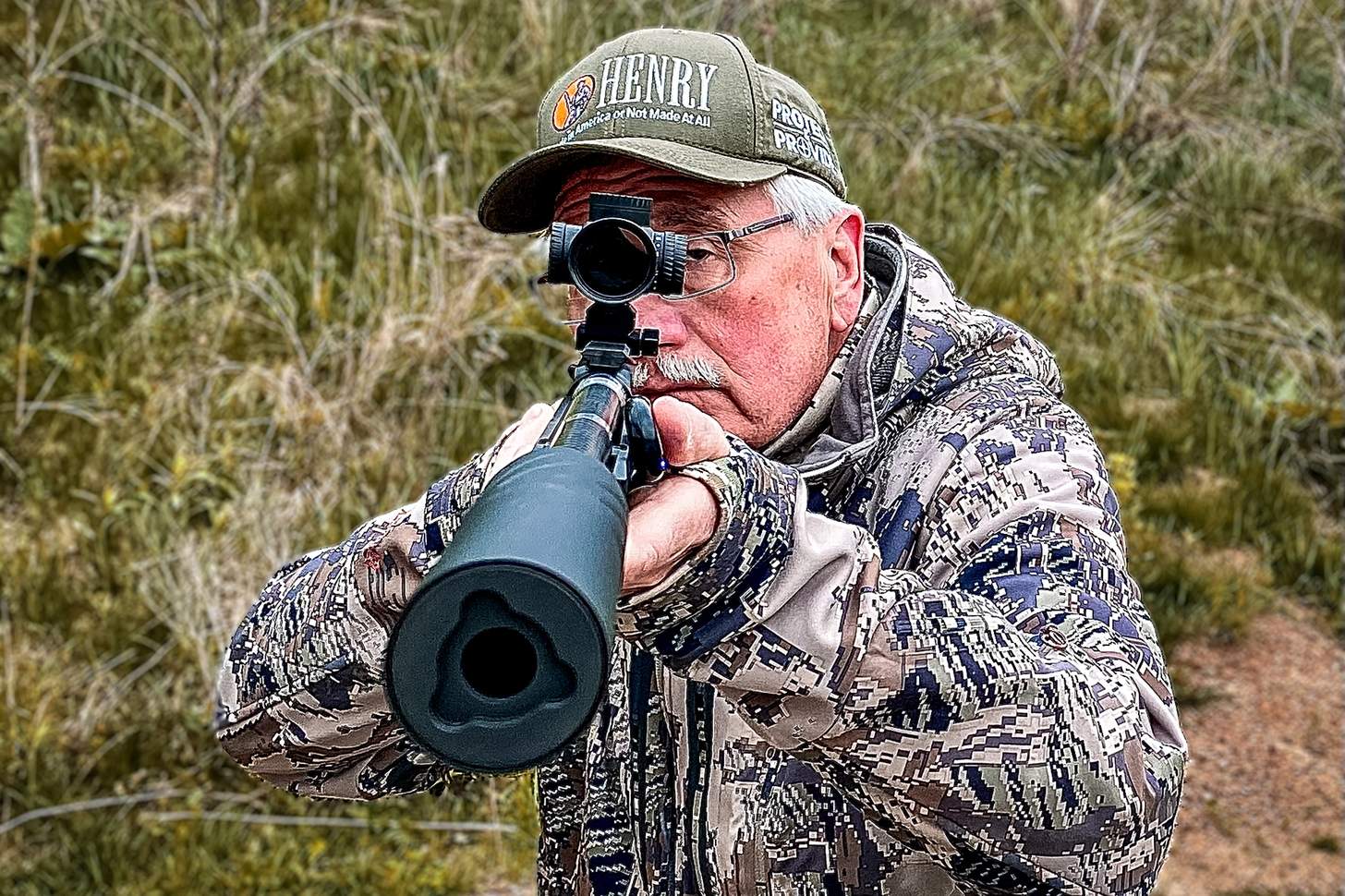 The author shooting the Henry SPD HUSH with a Banish 46-V2 suppressor and a EOTECH VUDU 3-9x32 LPVO optic