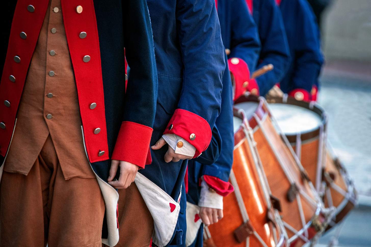 continental soldiers (reenactors) standing in formation with drums
