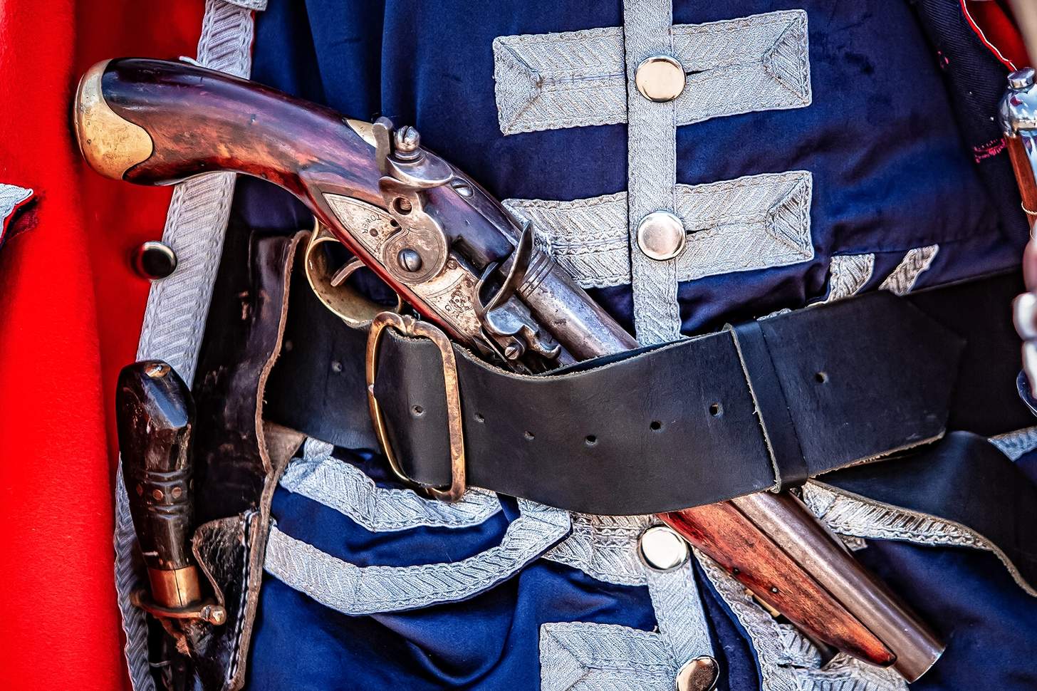 a flintlock pistol in the belt of a soldier circa american revolution
