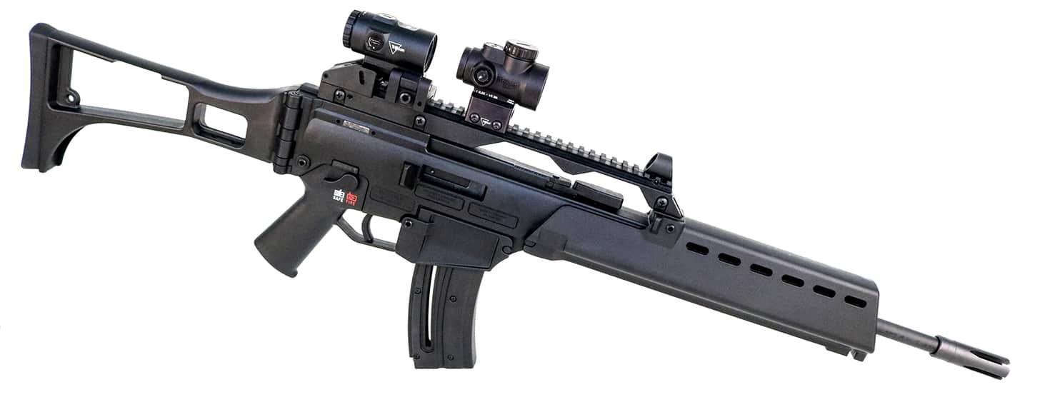 HK G36 Rimfire topped with a Trijicon red dot and magnifier