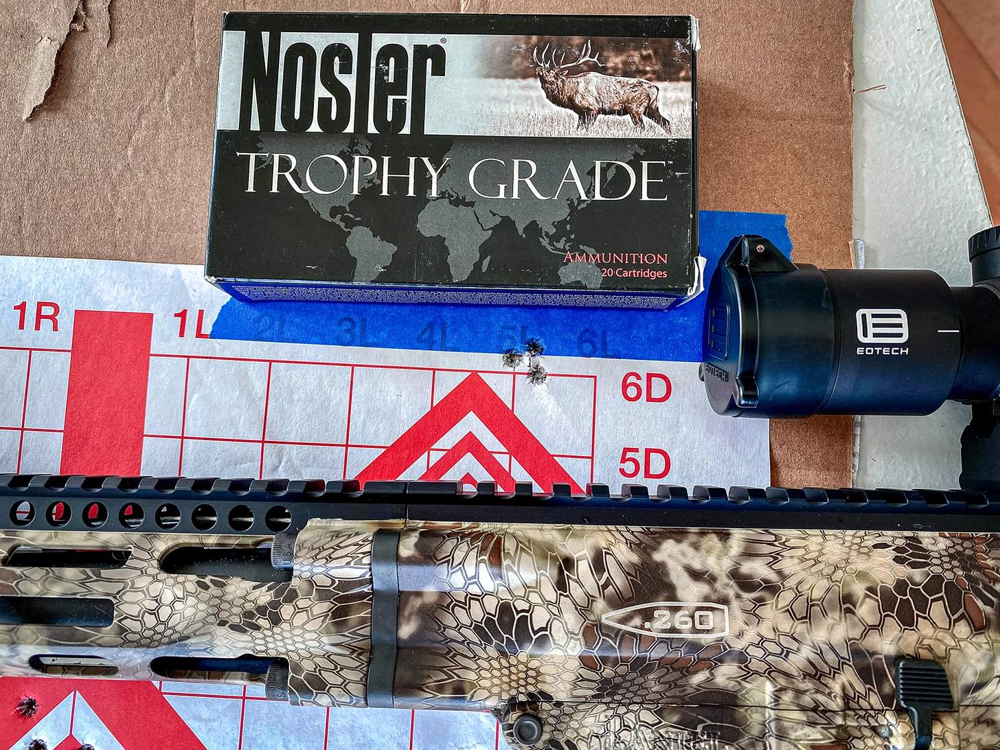 target with Nosler Trophy Grade ammunition box in 260 remington