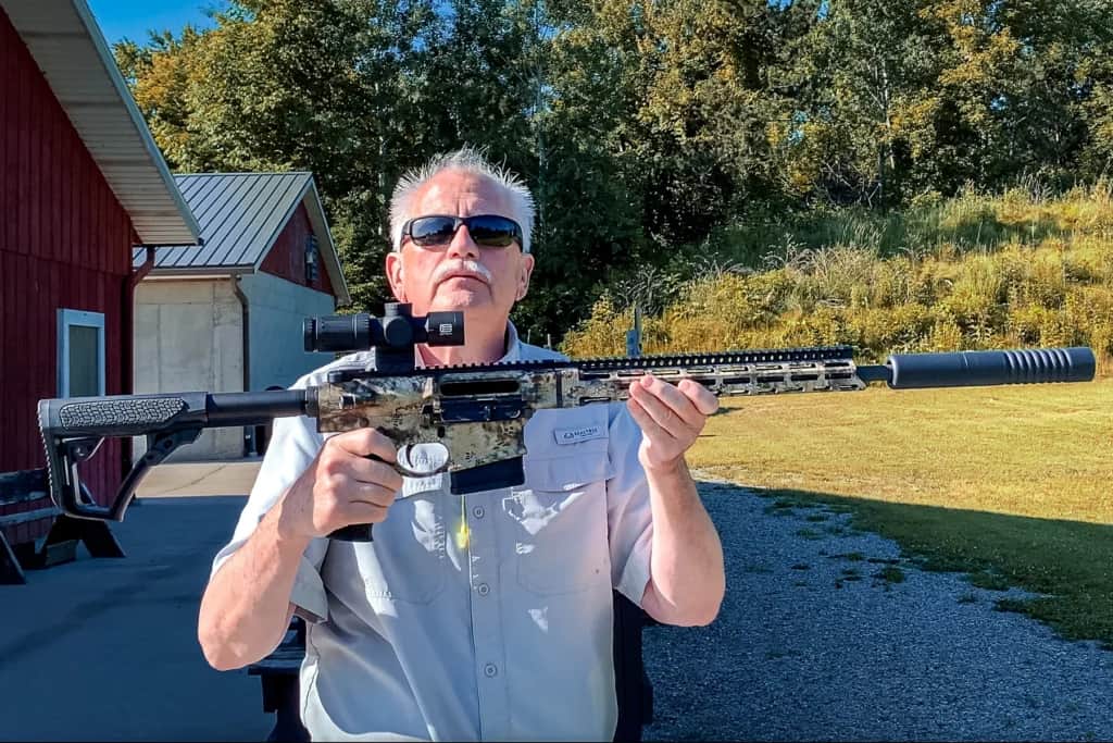 The author holding up the Daniel Defense DD5 V5 Hunter rifle