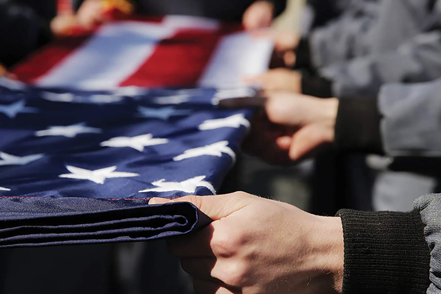 folds of honor flag being folded