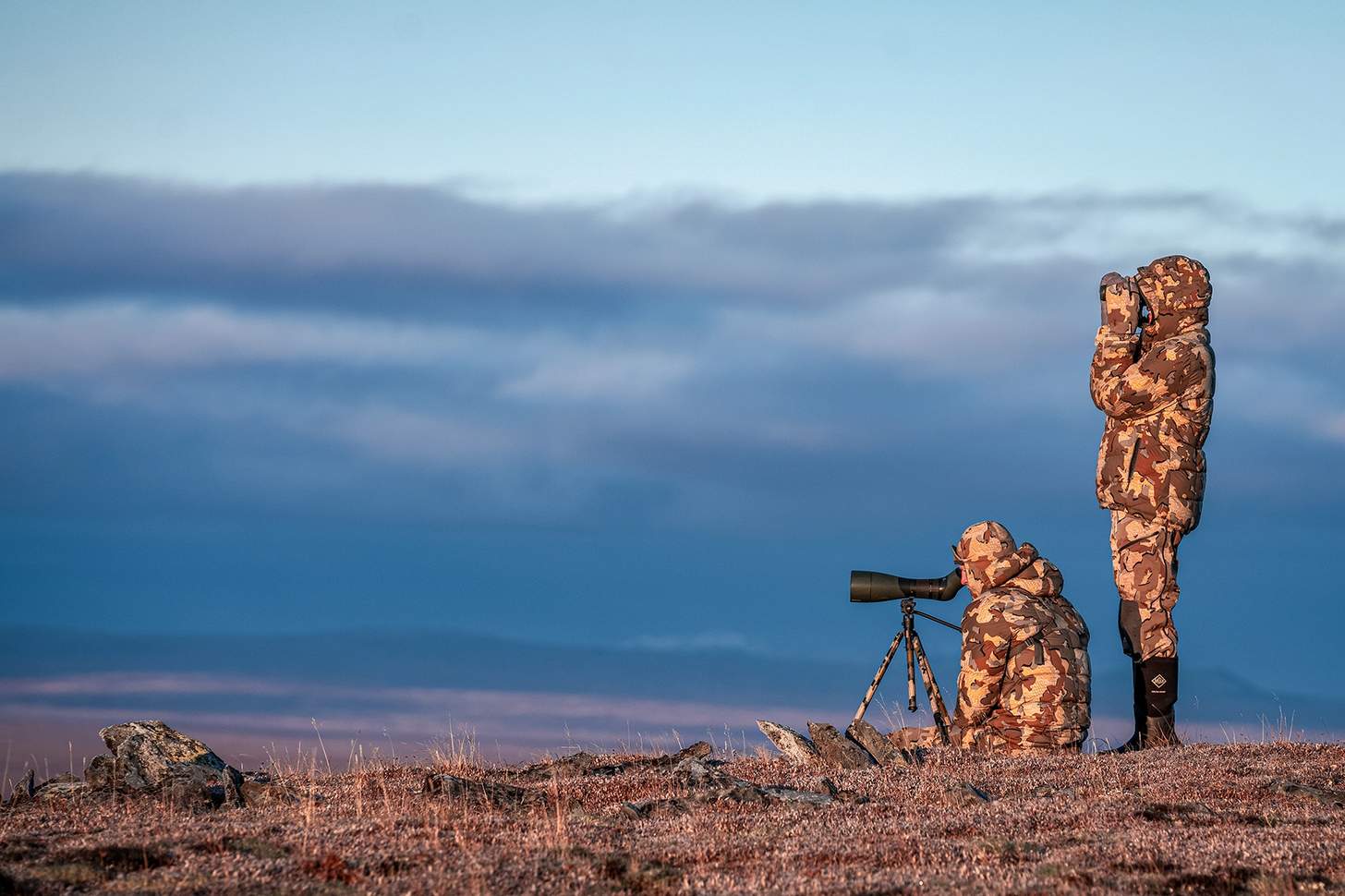 Two hunters glasing on the plains in KUIU camo