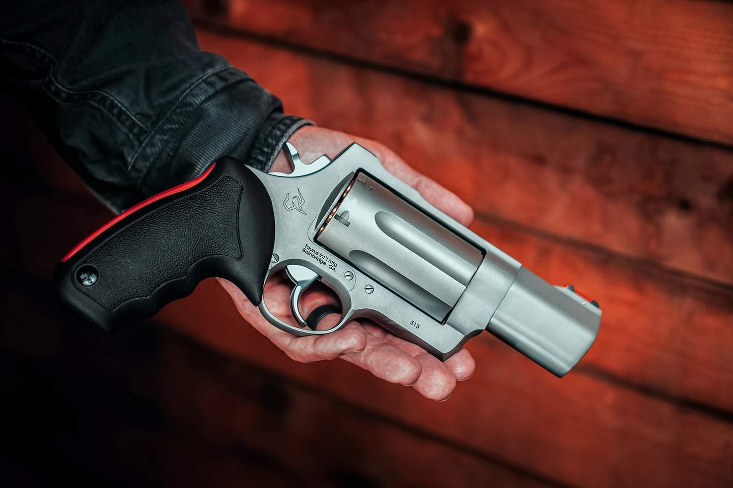 Taurus Raging Judge revolver in hand