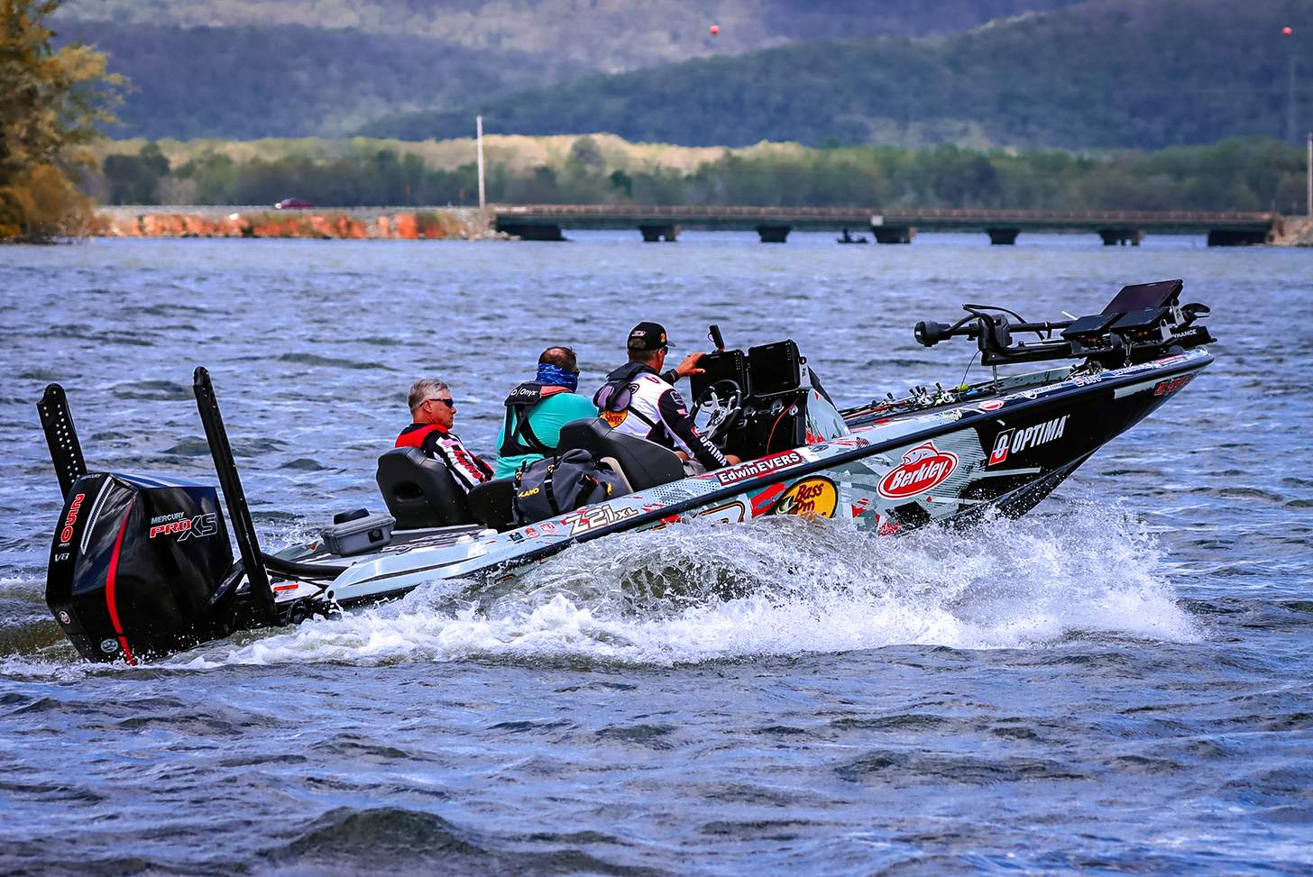 optima bass fishing boat speeding through the water