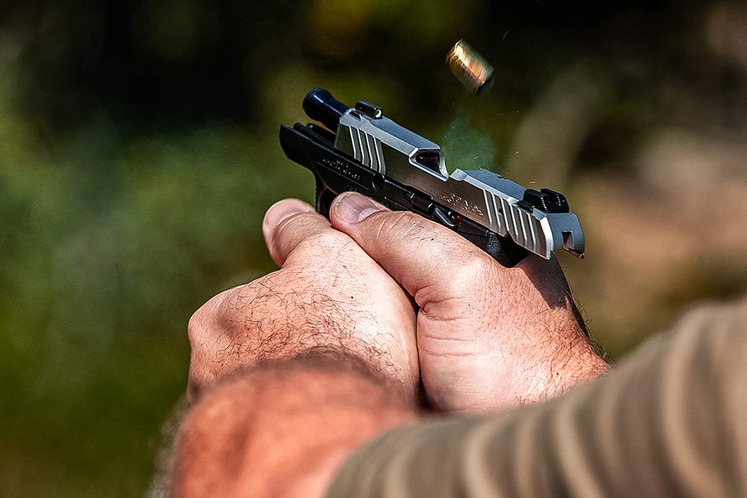 Ruger LCP Max pistol being fired on the range